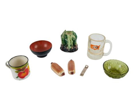 A group of kitchen items that belonged to Dennis Hopper, including a metal cup, a glass mug with the A&amp;W logo, two small 