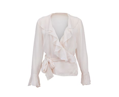 A top as seen worn by Meryl Streep as "Susan Orlean" in the comedy/drama Adaptation (Columbia Pictures, 2003).The white ruffl