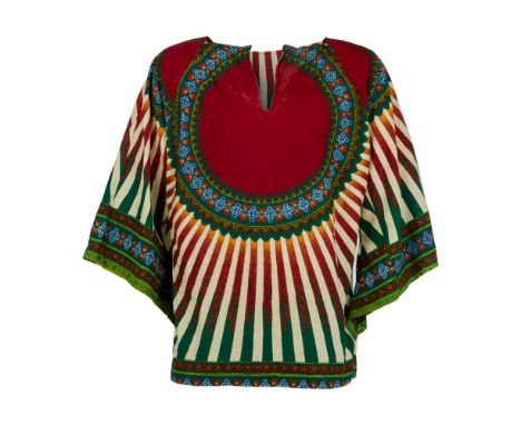 A pair of vintage African-print tunics, personally-owned by Dennis Hopper. This lot includes a cotton, multi-colored, long-sl