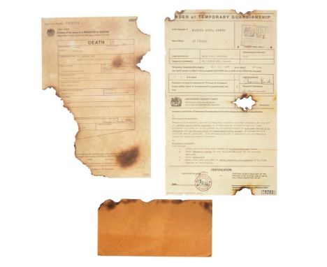 A set of burned guardianship and death registry documents as seen in Spectre (MGM, 2012).The guardianship document is dated J