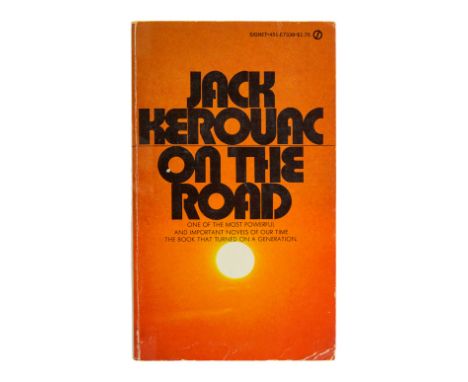 A paperback copy of On The Road (Signet, circa 1980s) by Jack Kerouac that belonged to Dennis Hopper and was inscribed "Satya
