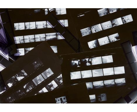 A group of five original contact sheets with accompanying negatives, containing images taken by Dennis Hopper. Most are of bu