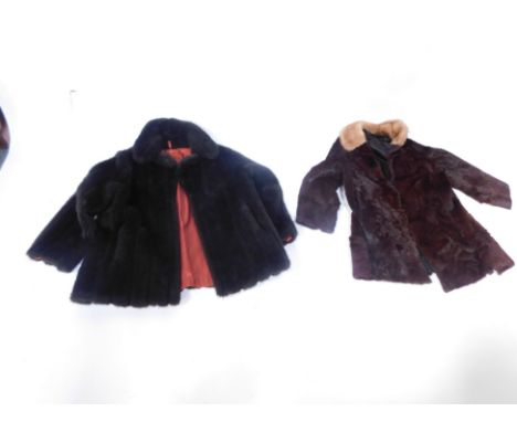 A lady's mink fur jacket, from Franklins For Furs of Leicester, with contrasting light coloured fur collar, and a further fur