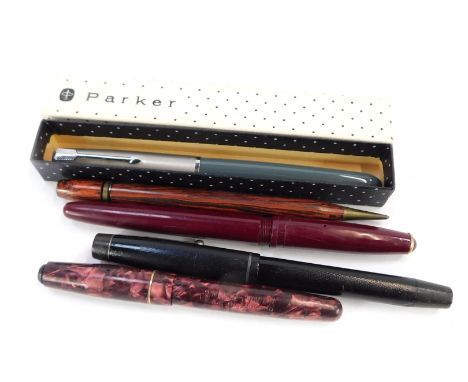 Four fountain pens and a biro, comprising a Parker 51, a roll tip maroon cased fountain pen, a Osmiroid red speckled fountain