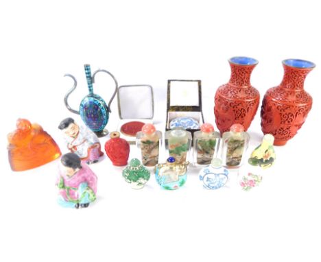 Oriental wares, comprising a pair of red lacquer vases, two seated Geisha figures, four cut glass scent bottles, various othe