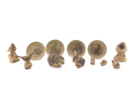 A group of Poole Pottery figures, comprising three mice, rabbit, three birds, hedgehog and four collector's plates.