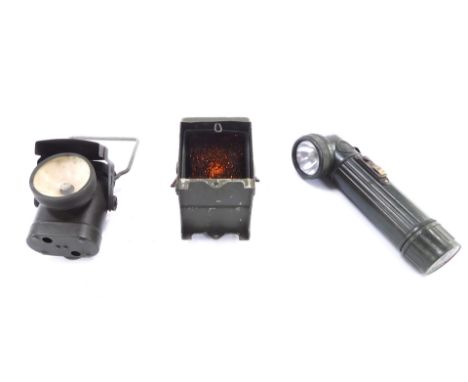 A WWII British army Lantern Electric Traffic No 2, WBB190GD, a Lamb's Electric lamp No 1 C.6.C, and a GPG torch. (3)