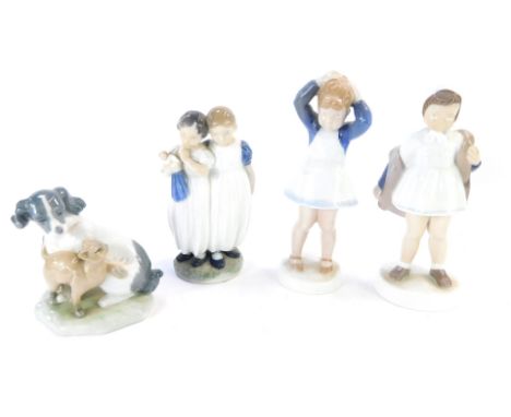 Four porcelain figure groups, comprising a Nao cat and dog, Bing &amp; Grondahl girl with coat, no 2387, and girl tying hair,