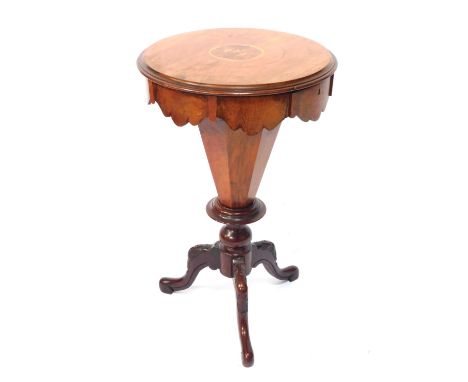 A Victorian walnut trumpet sewing table, the circular top with parquetry inlaid of birds, and ring banding, with shaped and m