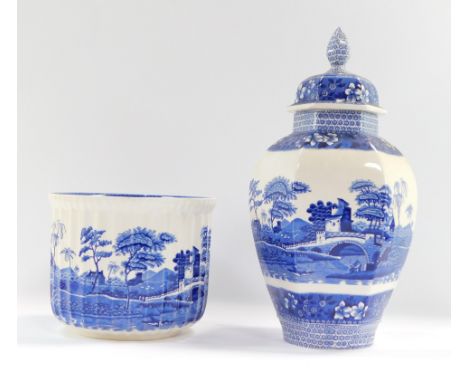 Two Spode Blue Tower ware ceramics, comprising a hexagonal jar and cover, 36cm high, and a planter, 17cm high. (2)