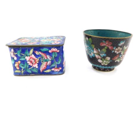 A late 19thC Chinese cloisonne box and cover, of oblong form, set with flowers against a blue ground, 5cm high, 9cm wide, 6cm