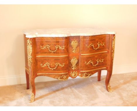 A 20thC kingwood parquetry commode, with marble top, gilt brass adornments to the two drawer front apron and legs, 89cm high,