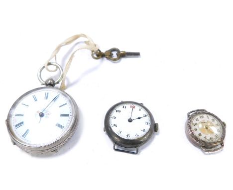 Three silver watches, comprising a Continental silver fob watch, with white enamel dial with Roman numeric borders and painte