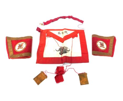 A group of RAOB regalia, comprising a red and cream apron bearing the initials KOM, and two  sleeves each with enamel plaque 