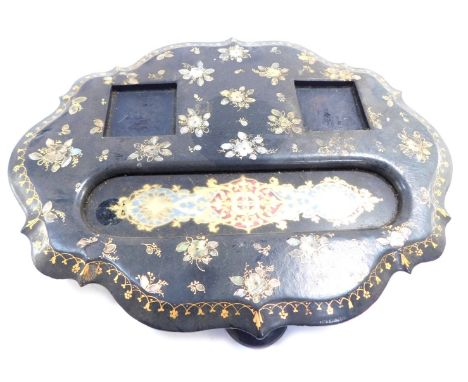 A Victorian papier mache desk stand, the flared top with applied gilt and mother of pearl detail, 29cm high.