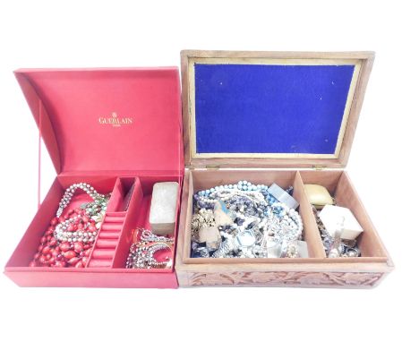 Two jewellery boxes and contents, comprising a carved wooden leaf bordered jewellery box and contents, of faux pearl necklace