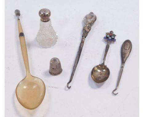 A group of small silver, comprising an Edward VII cut glass pepperette with silver lid, Birmingham 1907, thimble, two button 