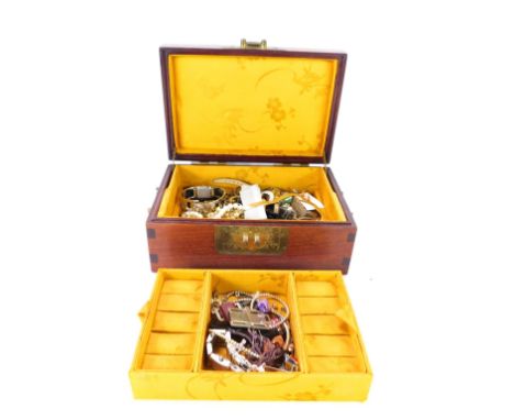 An Eastern hardwood mother of pearl inlaid jewellery box and contents, comprising belt buckles, wristwatches, bead necklaces,