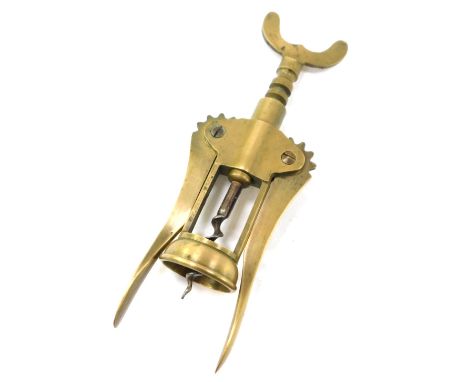 An early 20thC brass barrel corkscrew. 