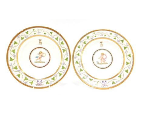 A pair of late 19thC Wedgwood porcelain plates, painted by J Thorley, with cherubs, one holding a staff and crosier, the othe