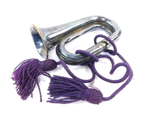 A Hawkes &amp; Son silver plated bugle, lacking mouthpiece, 26cm wide.
