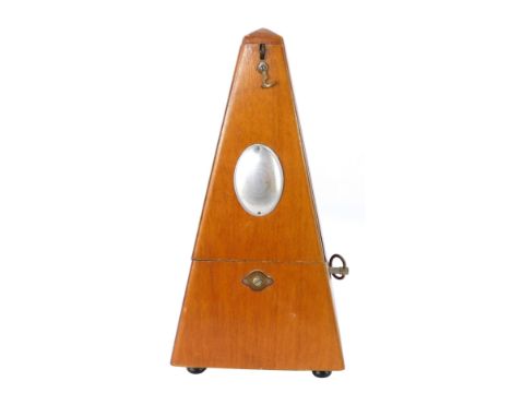 An System Maelzel wooden cased Metronome.
