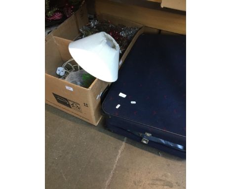 A suitcase and 2 boxes of Xmas decorations and pottery items including table lamp and vases 