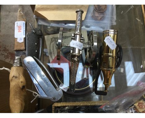 A lot comprising of penknives, a cannon lighter and a cannon model 