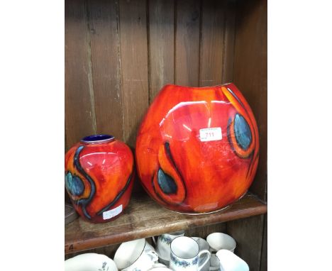 Two Poole pottery vases. 