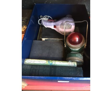 A box of misc books, a lamp, etc 