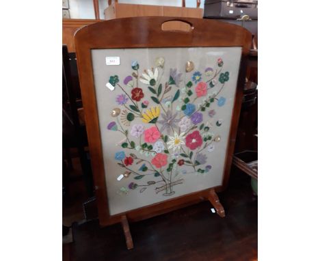 A tapestry fire screen 