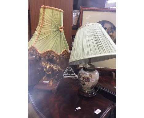 A pottery lamp and a horse figure lamp 
