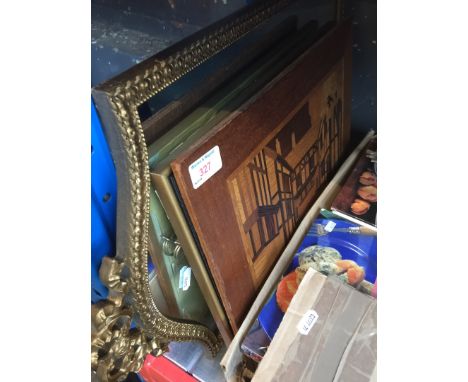 An ornate mirror, a print and a wooden panel 