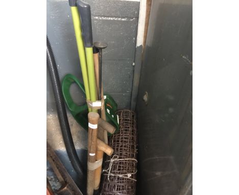 2 bundles of gardening tools, lawn aerator, plastic trellis, etc 