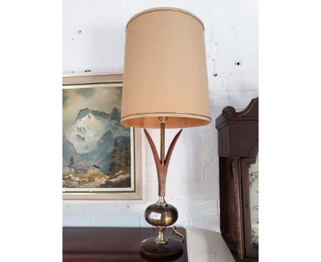 A retro teak and brass effect table lamp 