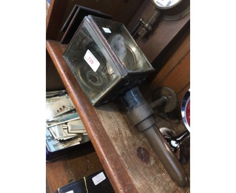 A carriage lamp and wall bracket. 