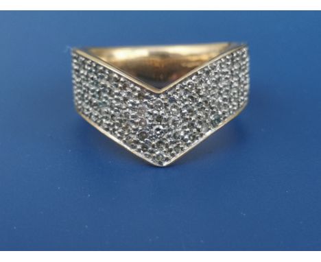 A diamond set 9ct gold wishbone-shaped band ring.  Finger size L.