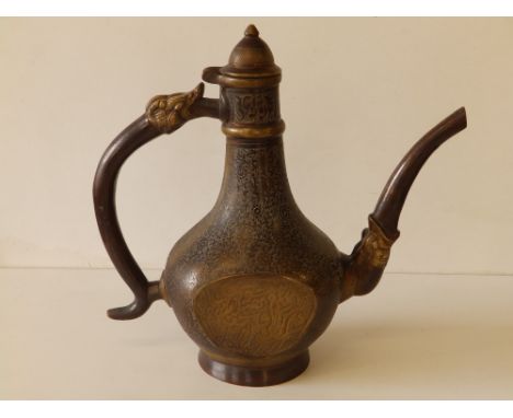 A Persian bronze coffee pot with overall engraved decoration of scrolls and script, 11" high.