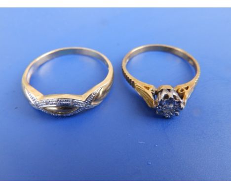 A modern illusion set diamond solitaire and one other ring. (2)