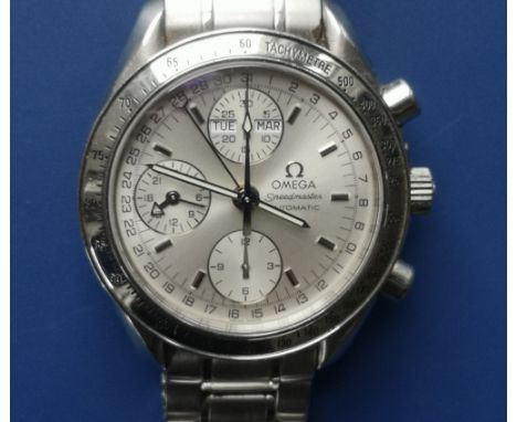 A boxed gent's stainless steel Omega Speedmaster Automatic chronograph bracelet wrist watch, the silvered dial with three sub