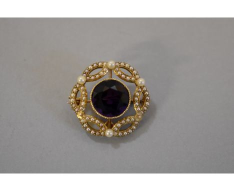 An amethyst and seed pearl gold brooch/pendant,&nbsp;stamped 15ct, 2.1cm 