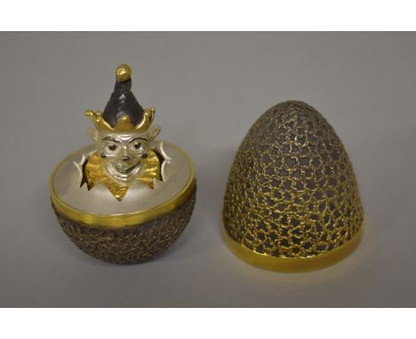 A silver gilt surprise Limited Edition Easter egg,&nbsp;by&nbsp;Stuart Devlin,&nbsp;London 1972, enclosing a spring mounted c