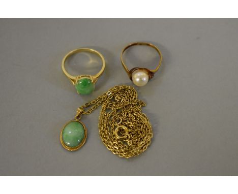 A cabochon jade gold ring; together with a similar pendant; and a pearl gold ring, all stamped 585, 9.1g total weight, 6.2g w