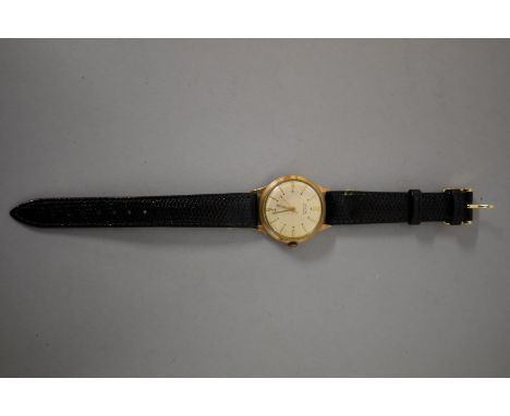 A circa 1958 Avia 9ct gold manual wristwatch, 32mm, on replacement leather strap. 