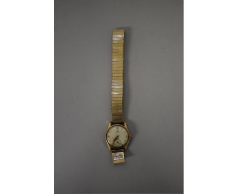 A circa 1958 Omega 9ct gold manual wind wristwatch, 34mm, cal 267, on replacement gold plated expanding bracelet. 