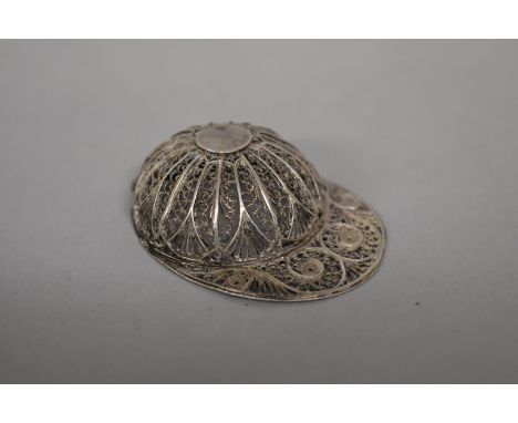 A Georgian silver filigree 'Jockey Cap' caddy spoon, possibly by Samuel Pemberton,&nbsp;5.5cm long.