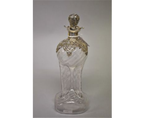 A late Victorian silver mounted clear glass decanter and stopper, by Henry Matthews, Birmingham 1901, 28.5cm high. 