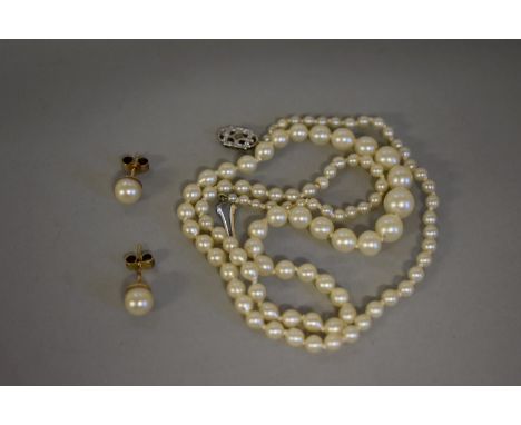 A graduated single strand pearl necklace,&nbsp;the clasp stamped 9ct, 48cm; together with a pair of pearl ear studs. 