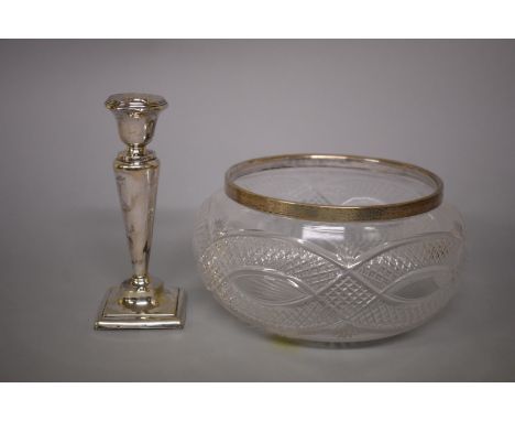 An Edwardian&nbsp;cut glass silver mounted fruit bowl,&nbsp;by&nbsp;WHS,&nbsp;Birmingham 1905; together with a silver candles