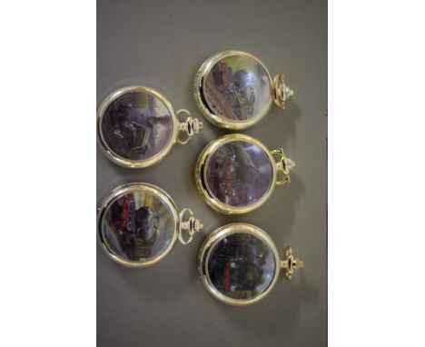Five modern pocket watches, each decorated with a steam engine. 